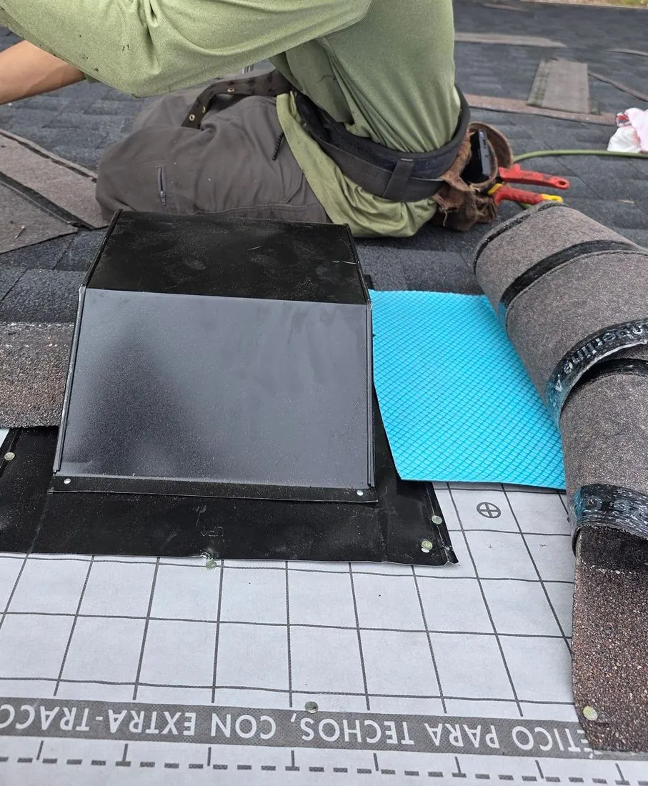 Slant-back box vent on an asphalt shingle roof in Central Texas