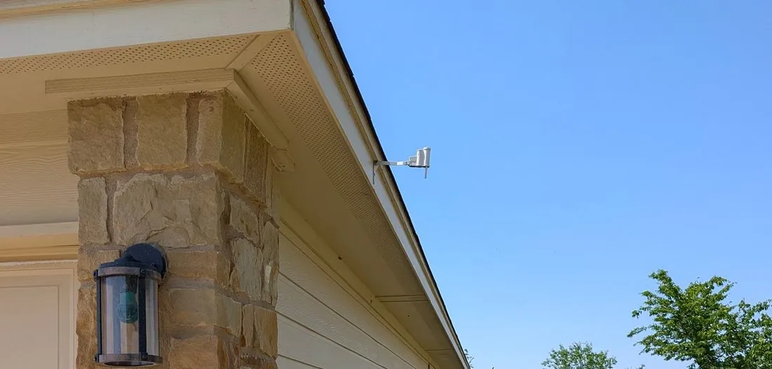 Vented soffit panels under a roof overhang on a Central Texas home, the intake for attic ventilation