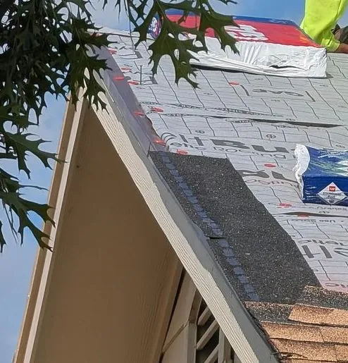 Starter strip shingle at a roof edge before the first field course is laid
