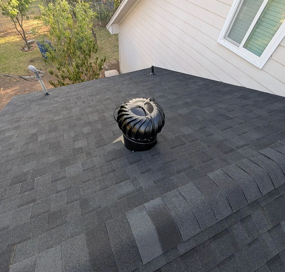 Turbine vent on an asphalt shingle roof in Central Texas