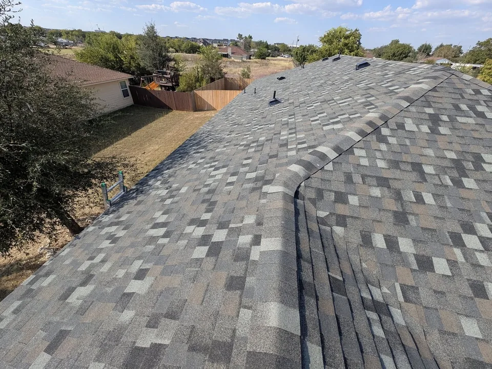 Ridge line on a multi-tone architectural shingle roof