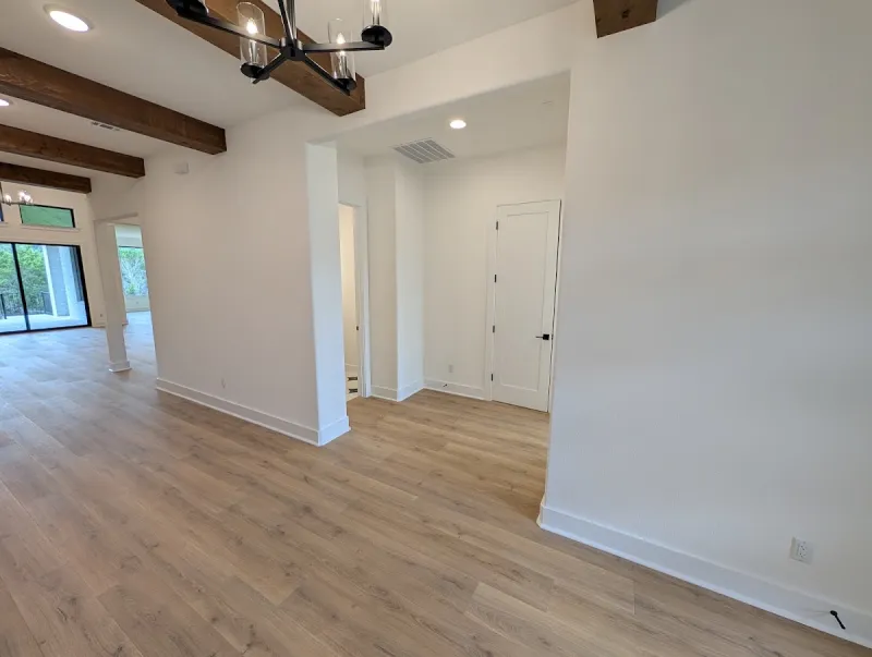Interior room before repainting in Georgetown Texas new construction home